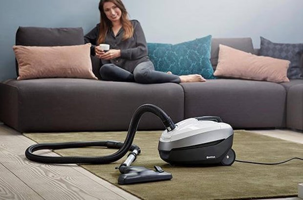 White select vacuum cleaner in living room