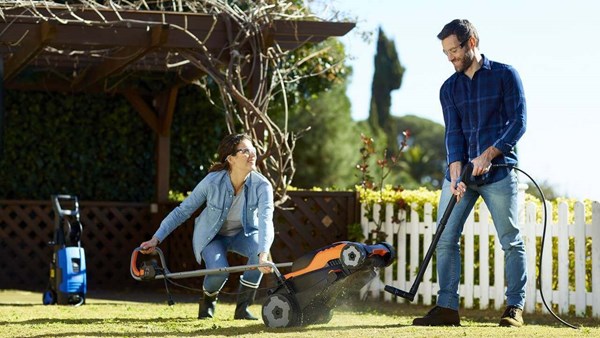 Cleaning lawn mower with high pressure washer